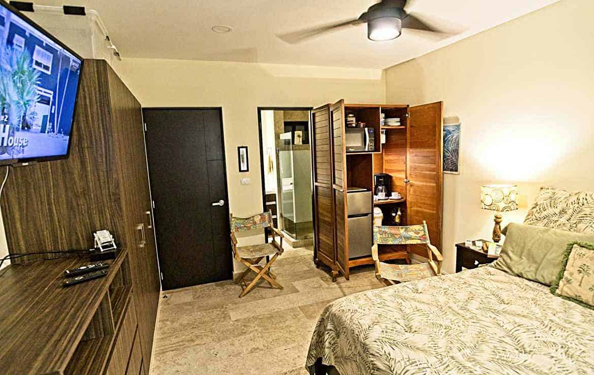 Hotel-style suite with a rooftop pool one level up.