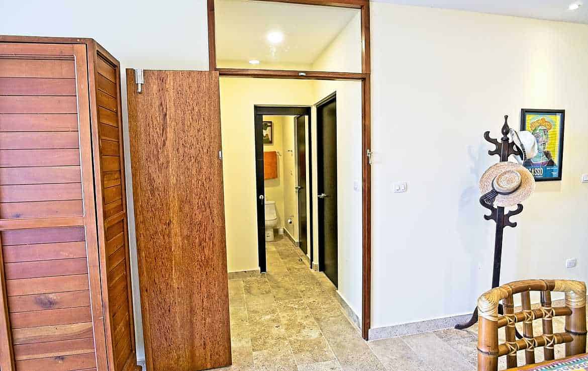 Veranto doorway to guest bedroom, bathroom and rooftop.
