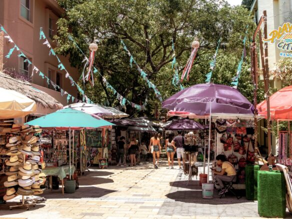 Condominium building and house in Playa del Carmen, illustrating the comparison between buying a condominium and buying a house in Playa del Carmen.