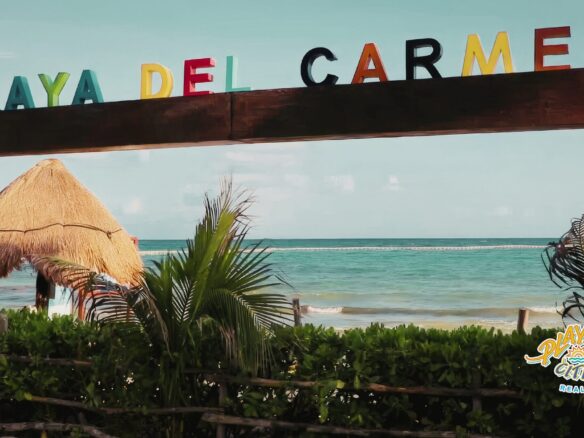 Condominium building in Playa del Carmen with pool and common areas, illustrating the true cost of owning a condominium in Playa del Carmen, including homeowners association fees, utilities, and property taxes.