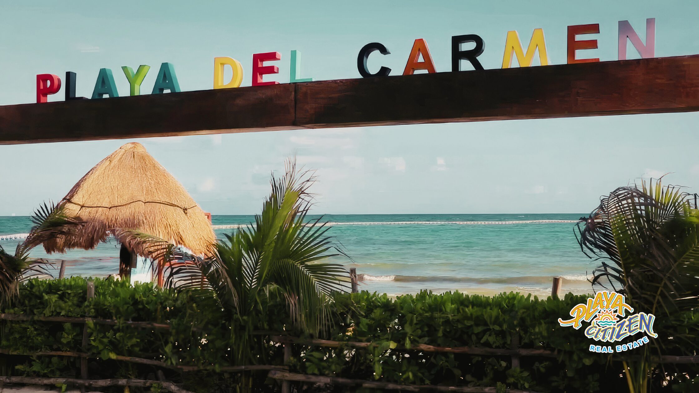Condominium building in Playa del Carmen with pool and common areas, illustrating the true cost of owning a condominium in Playa del Carmen, including homeowners association fees, utilities, and property taxes.