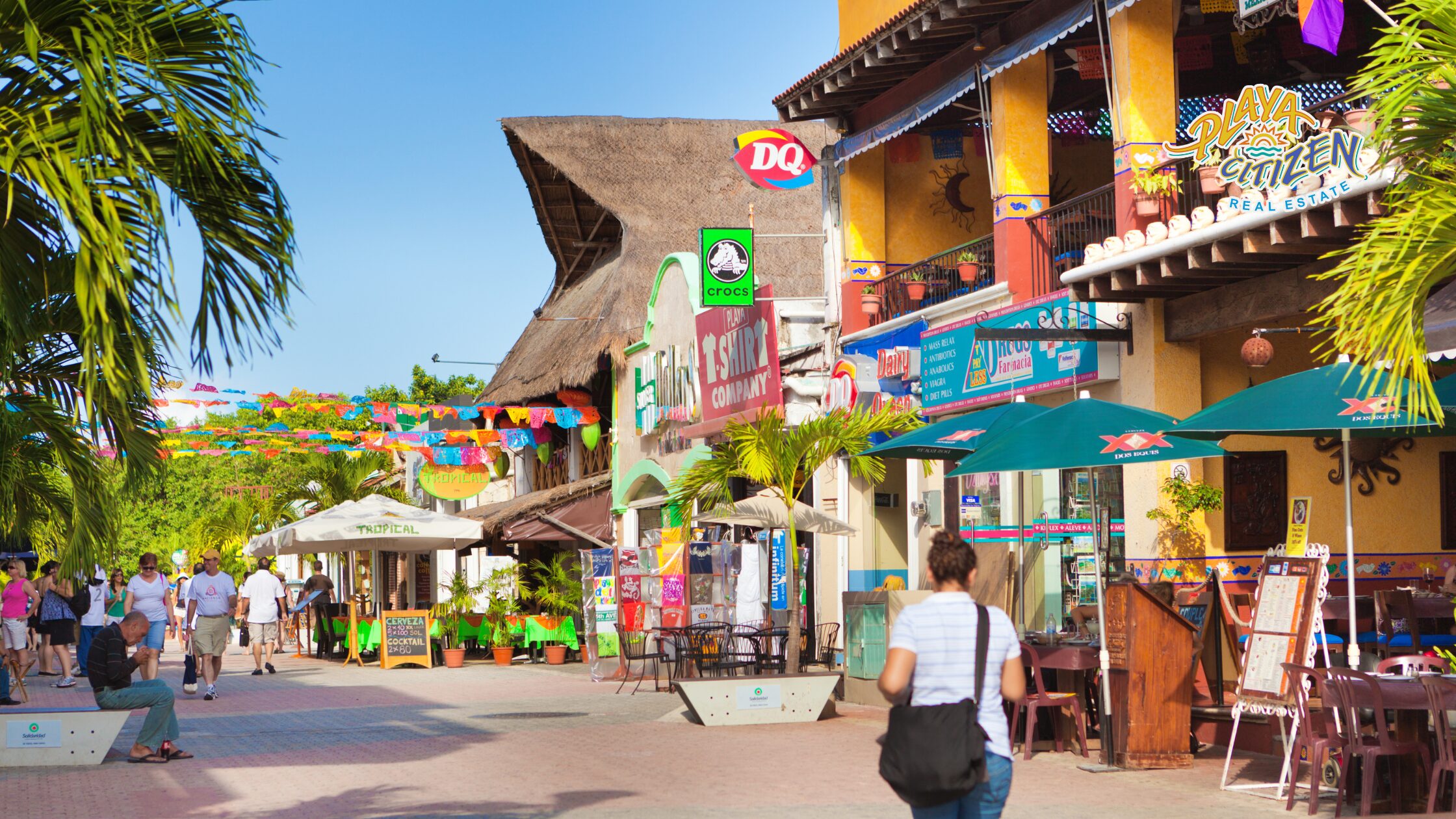 Real estate agent showing properties in Playa del Carmen to a client interested in buying real estate.